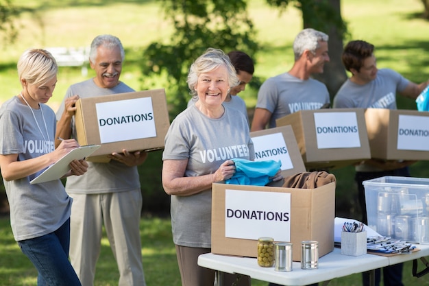 happy-family-holding-donations-boxes_13339-106411